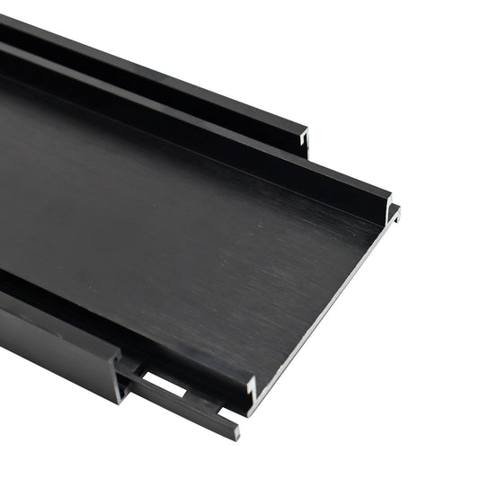 Brushed black aluminium tile insert drain for bathrooms and wet areas, featuring a modern linear floor waste design for efficient water drainage and concealed tile integration.