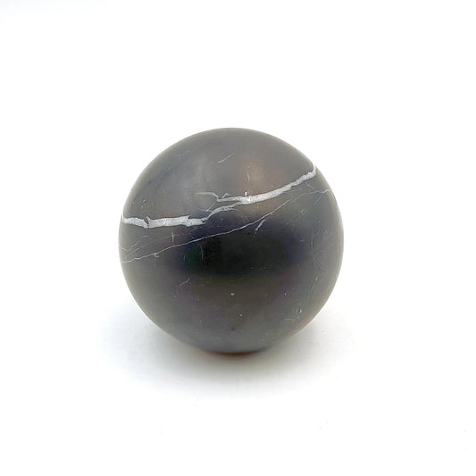Huss Overlook polished marble decorative sphere 100mm crafted from solid natural stone with unique natural veining, ideal for home décor, coffee tables, shelves, offices, and luxury interior styling.
