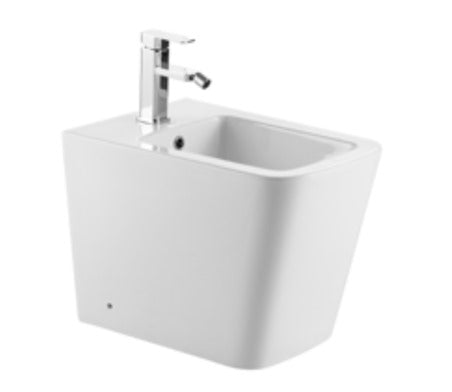 Matte white floor standing bidet with modern ceramic design, durable finish, and hygienic bathroom sanitation feature