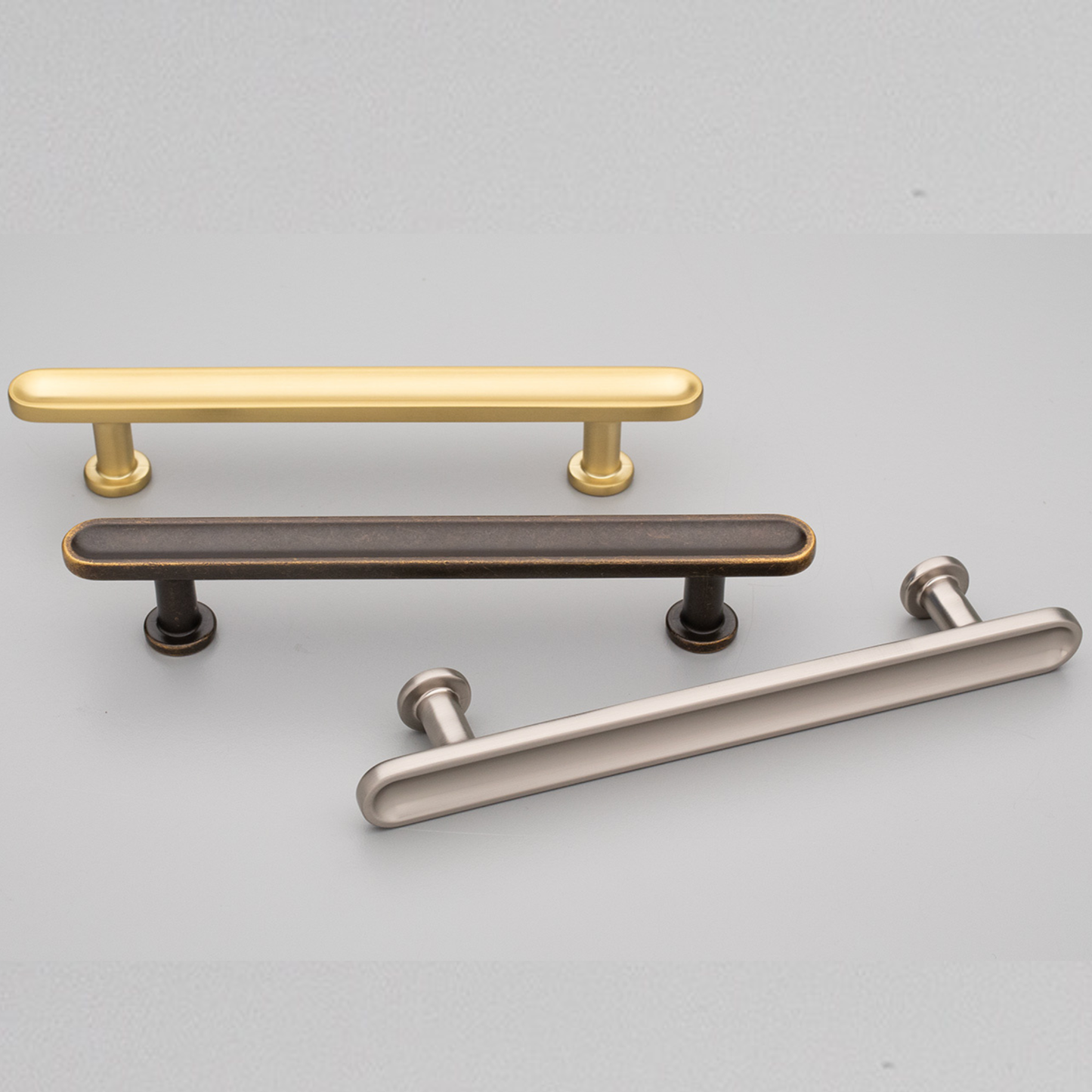 Kethy Randers die-cast zinc cabinet pull handle in Antique Brown, Dark Brushed Gold, and Stainless Effect finishes