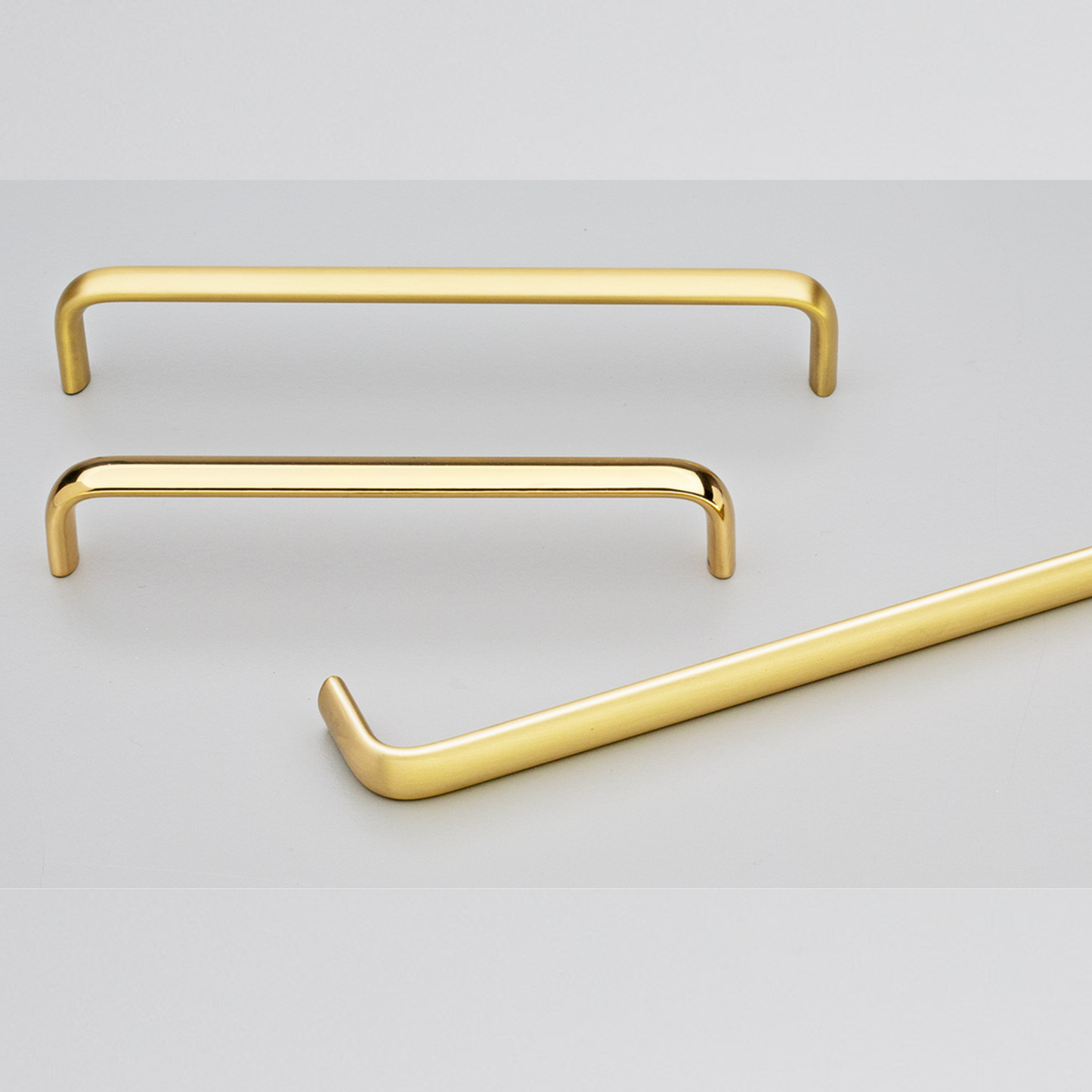 Kethy Trumpet solid brass cabinet and drawer handle in polished brass gloss or brass matt finish, available in 128mm, 160mm, 224mm centres