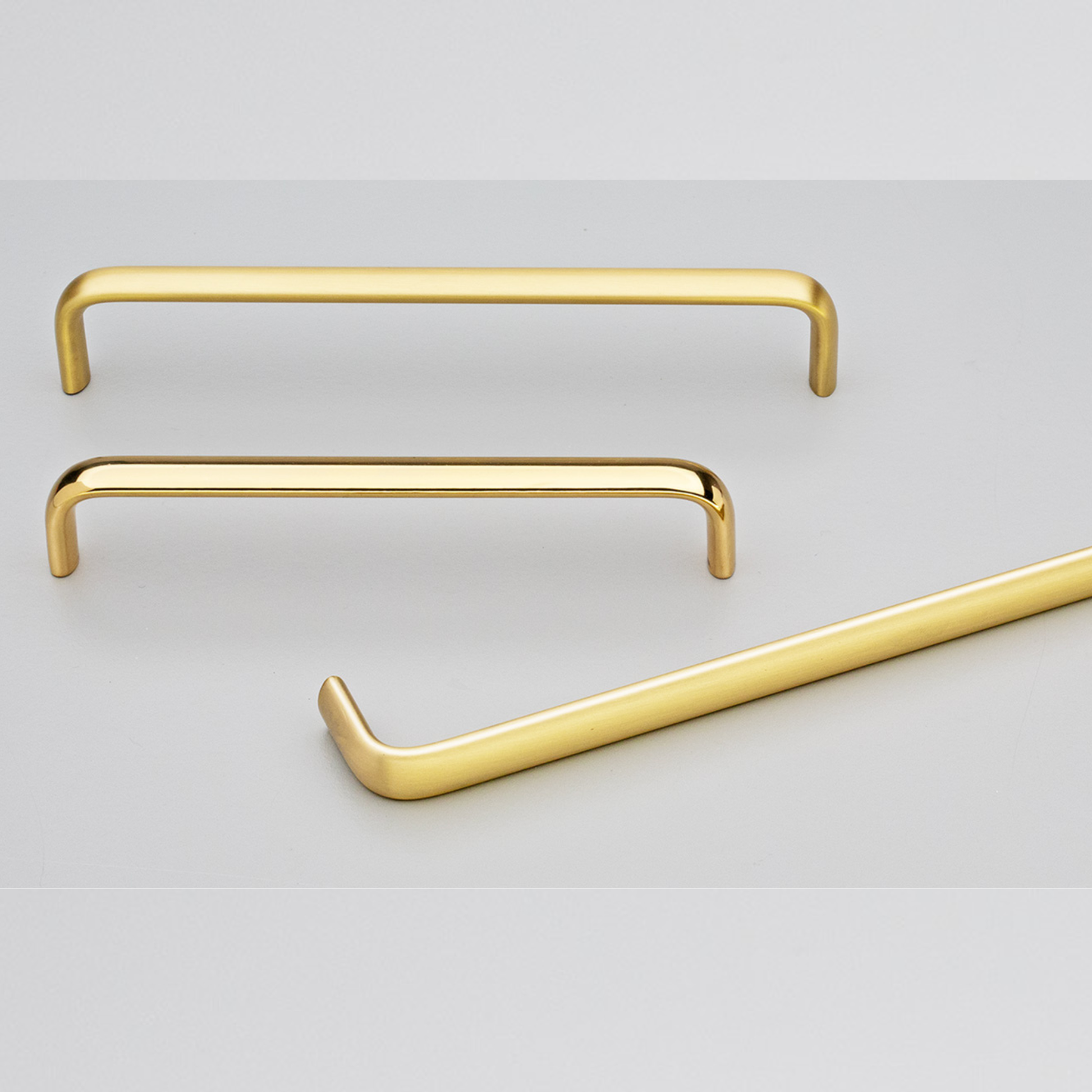 Kethy Trumpet solid brass cabinet and drawer handle in polished brass gloss or brass matt finish, available in 128mm, 160mm, 224mm centres