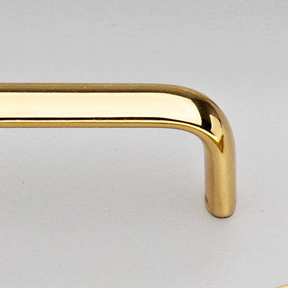 Kethy Trumpet solid brass cabinet and drawer handle in polished brass gloss or brass matt finish, available in 128mm, 160mm, 224mm centres