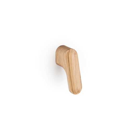 Momo Luv angled cabinet hardware range featuring knob and D handle options, designed for modern cabinets and drawers with a contemporary ergonomic profile suitable for premium interior applications.