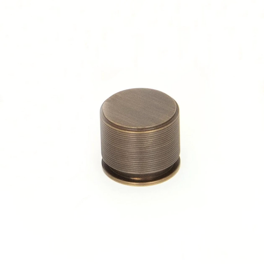 35mm Sussex solid brass cabinet knob by Momo Handles with lined textured design, durable decorative hardware for kitchen cabinets, drawers, and modern furniture joinery.
