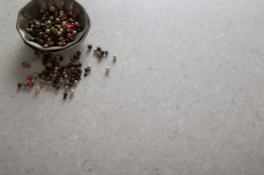 Ash Grey Deluxe quartz stone benchtop slab with elegant grey finish, ideal for kitchen benchtops, bathroom vanities, and laundry countertops.