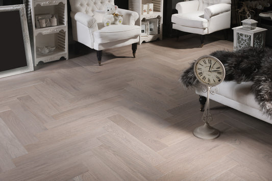 Chambord herringbone engineered oak timber flooring by Coswick featuring a rich natural oak finish, durable hardwood construction, and classic parquet pattern for elegant residential and commercial interiors.