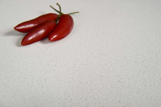 Luna White quartz stone with a durable white engineered surface for kitchen benchtops, bathroom vanities, and laundry countertops.