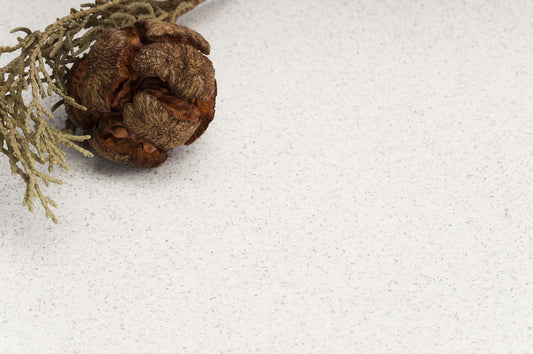 Reflections White quartz stone with a durable white engineered surface for kitchen benchtops, bathroom vanities, and laundry countertops.
